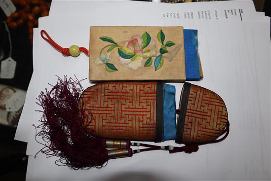 A 19th century Chinese embroidered silk spectacle case and a similar purse